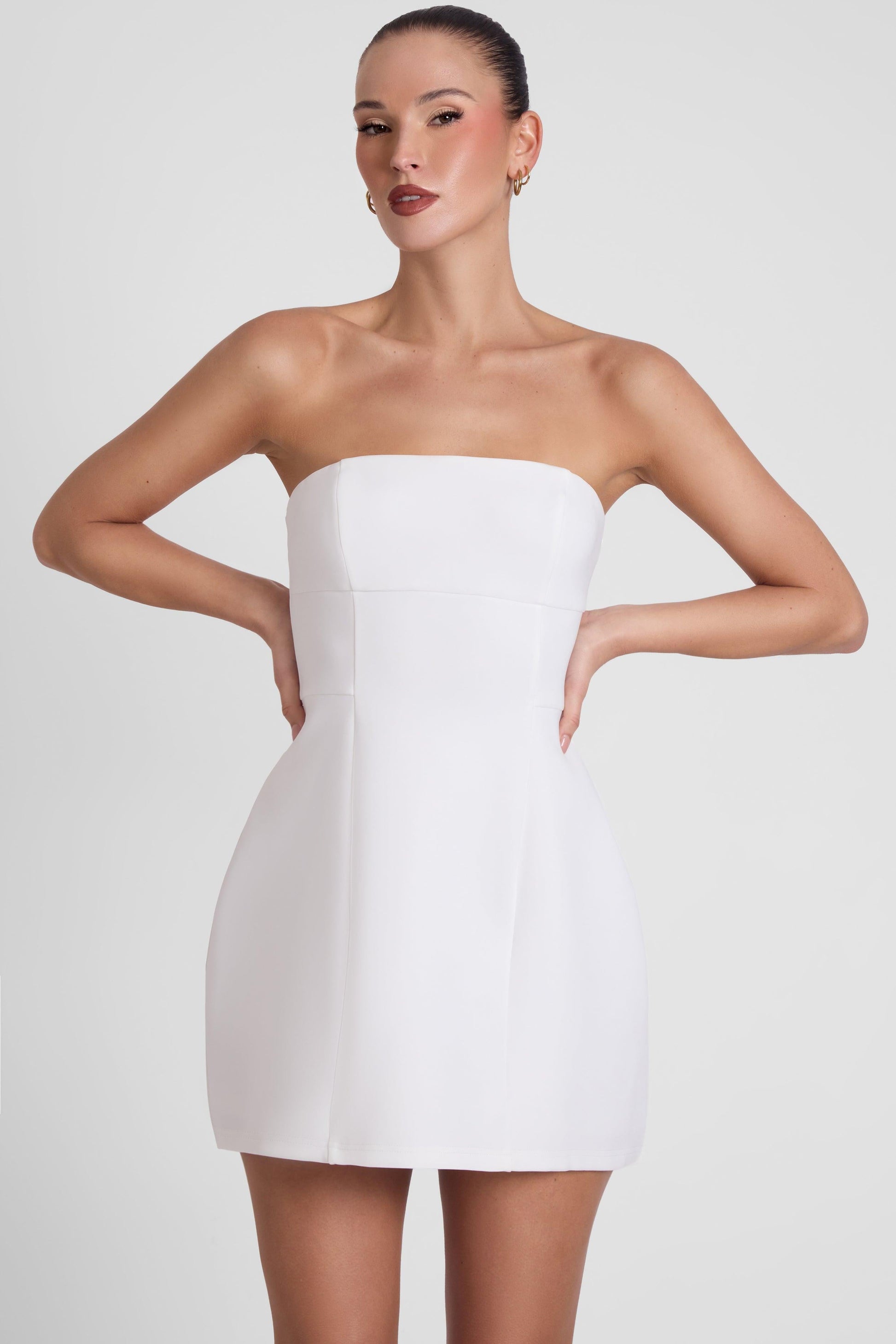 Eres Collection | White Mini Dress with Fitted Bodice & Unique Seam Detail | Elegant Design for Effortless Style 0